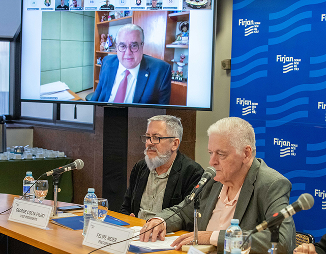 Dep. Augusto Coutinho (no telão), George Costa Filho e Felipe Meier, respectivamente, vice e presidente do Conselho