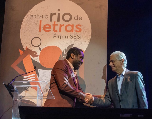 O ator e escritor Lázaro Ramos e o presidente da Firjan, Luiz Césio Caetano, durante a primeira edição do evento